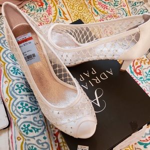 White shoes. By Adrien